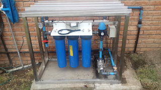 Pressurized rainwater purification unit