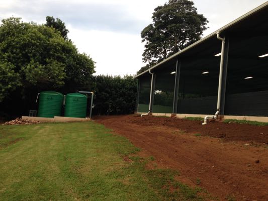Rainwater tanks at indoor tennis court